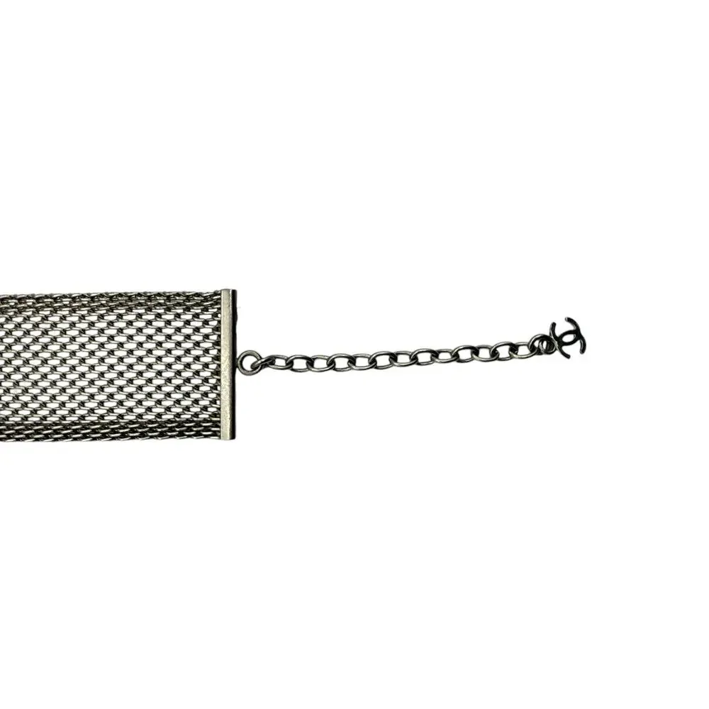 CHANEL Camellia with mesh silver choker collar.